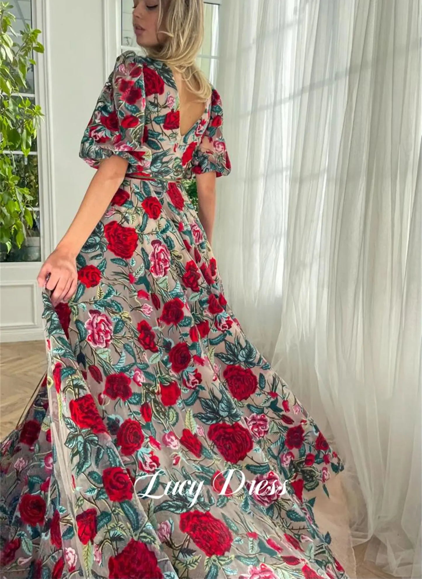 قال ChatGPT:  Lucy Elegant Floral Lace Evening Gown