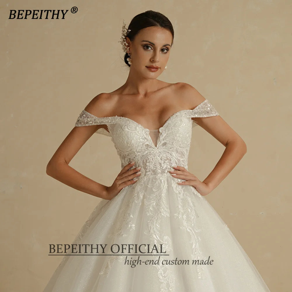 BEPEITHY Custom Sweetheart Wedding Dress – Ivory Glitter Sleeveless Bridal Ball Gown 2025