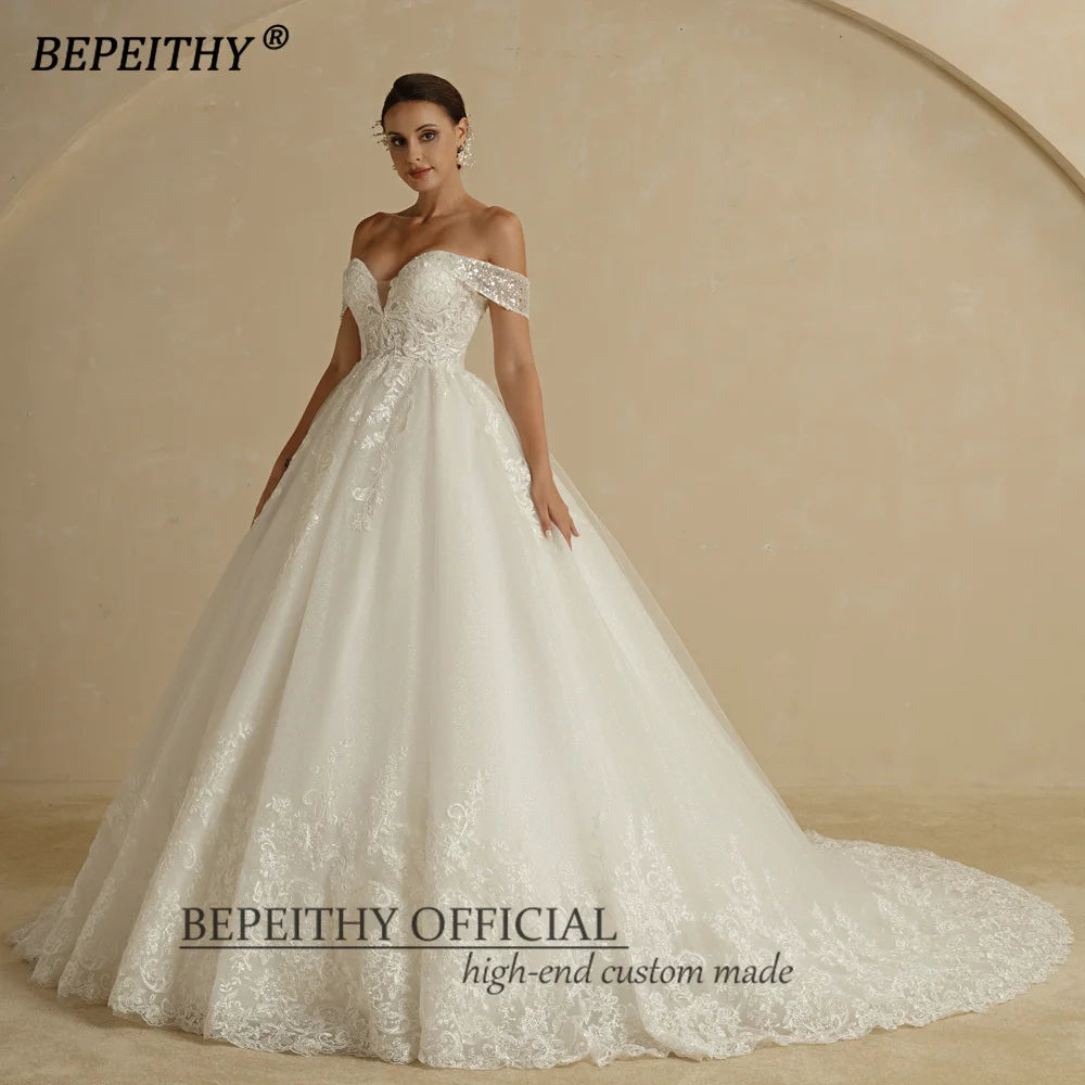 BEPEITHY Custom Sweetheart Wedding Dress – Ivory Glitter Sleeveless Bridal Ball Gown 2025