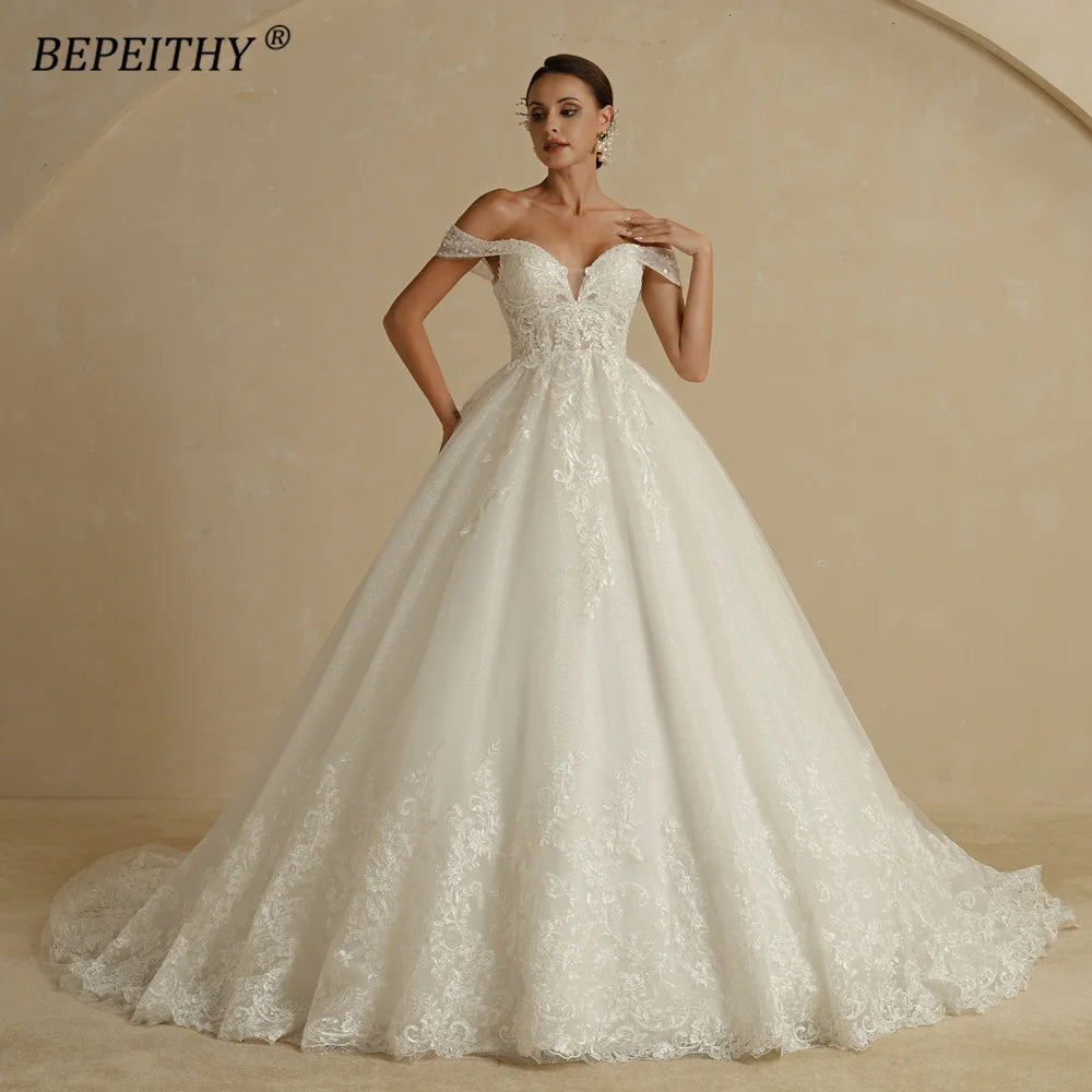 BEPEITHY Custom Sweetheart Wedding Dress – Ivory Glitter Sleeveless Bridal Ball Gown 2025