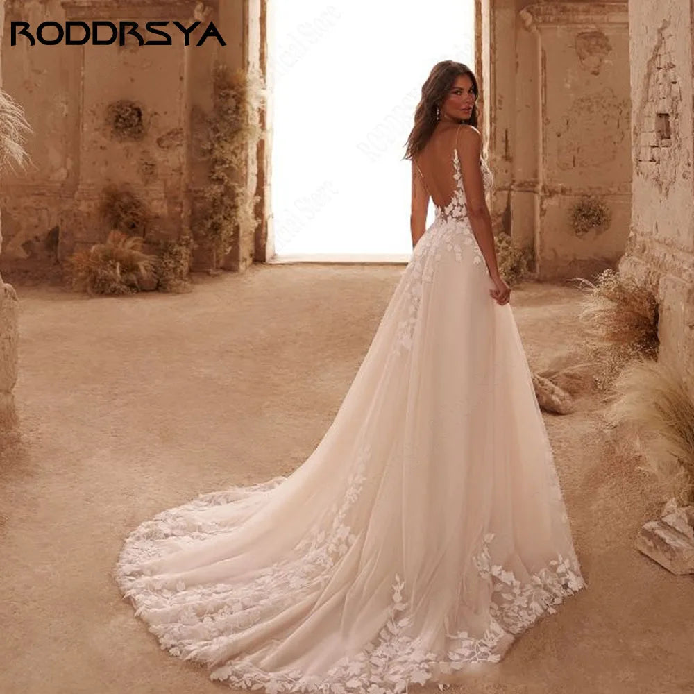 RODDRSYA Glitter Wedding Dress – Spaghetti Straps V-Neck Backless Boho Bridal Gown with Train