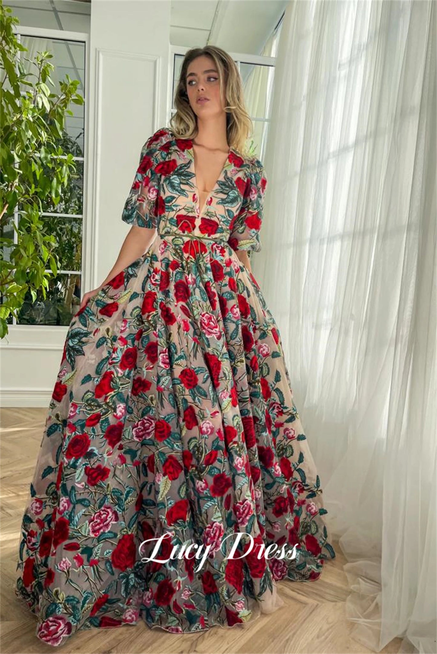 قال ChatGPT:  Lucy Elegant Floral Lace Evening Gown