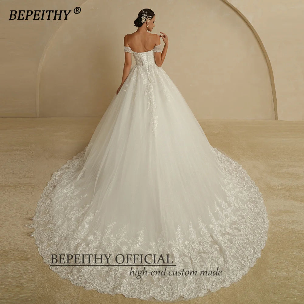 BEPEITHY Custom Sweetheart Wedding Dress – Ivory Glitter Sleeveless Bridal Ball Gown 2025