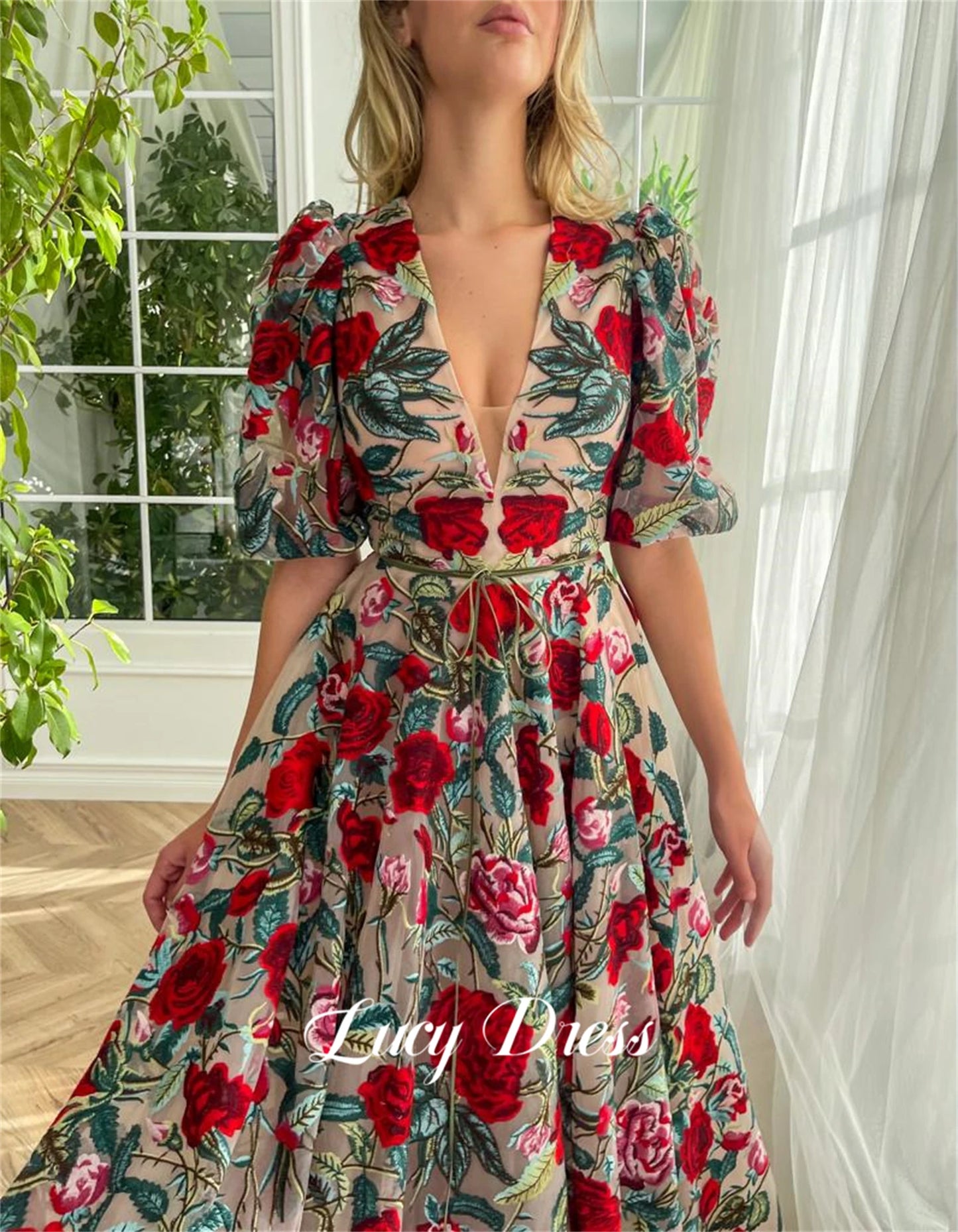 قال ChatGPT:  Lucy Elegant Floral Lace Evening Gown