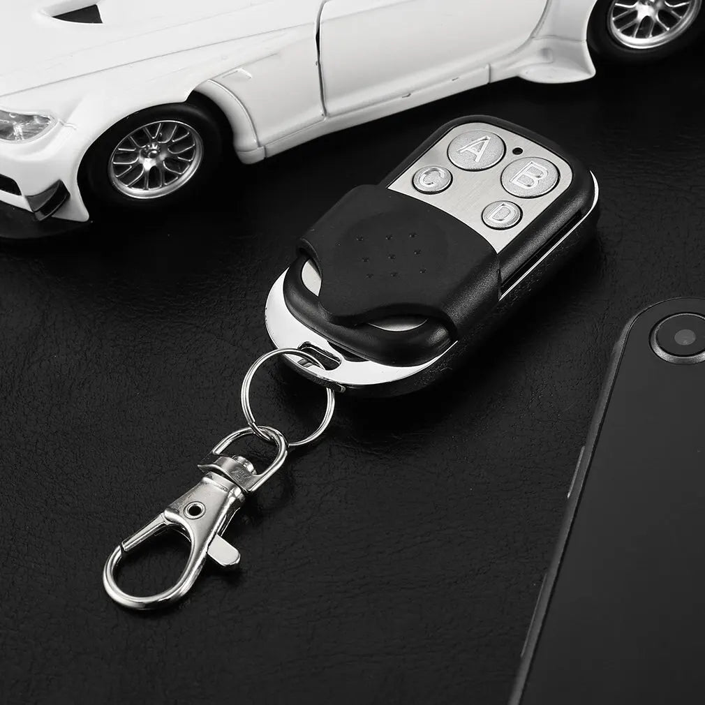 Metal Push Button Remote Control – 4-Button 433MHz Universal Garage Door Opener (ABCD/Lock/Unlock)