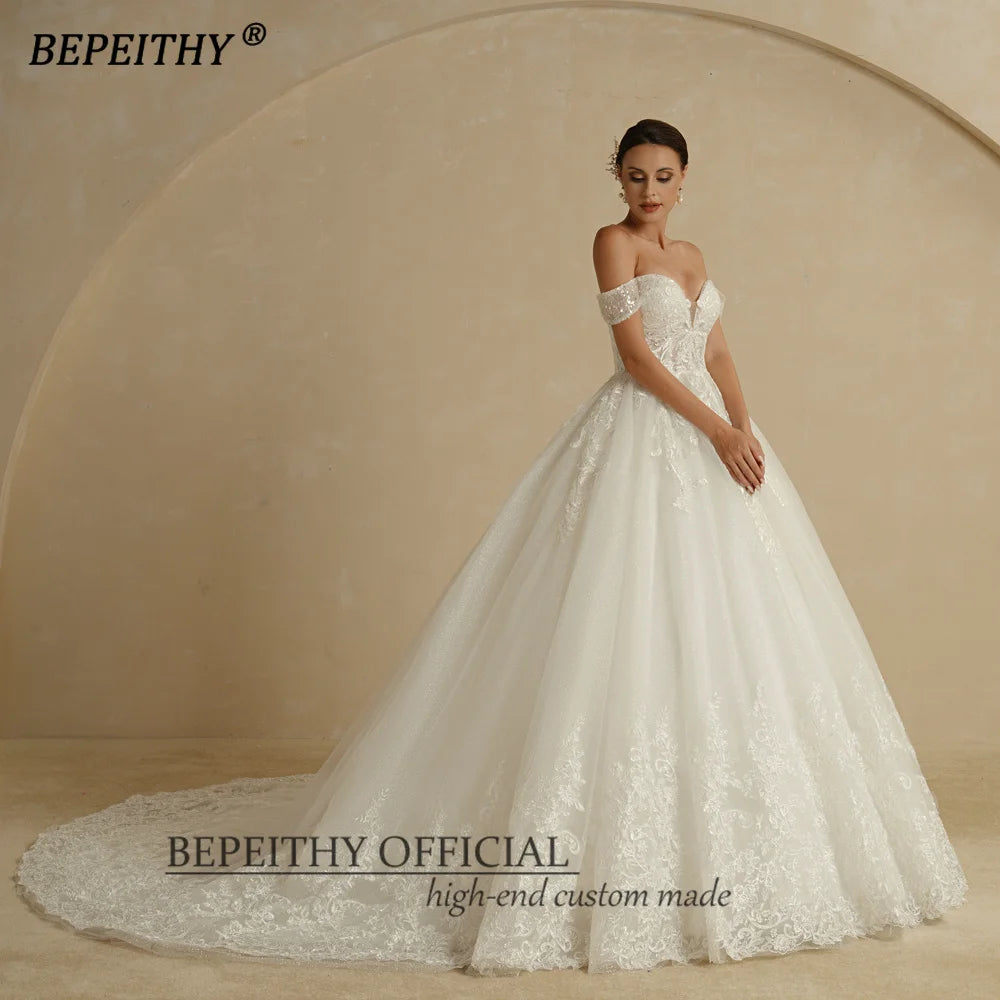 BEPEITHY Custom Sweetheart Wedding Dress – Ivory Glitter Sleeveless Bridal Ball Gown 2025